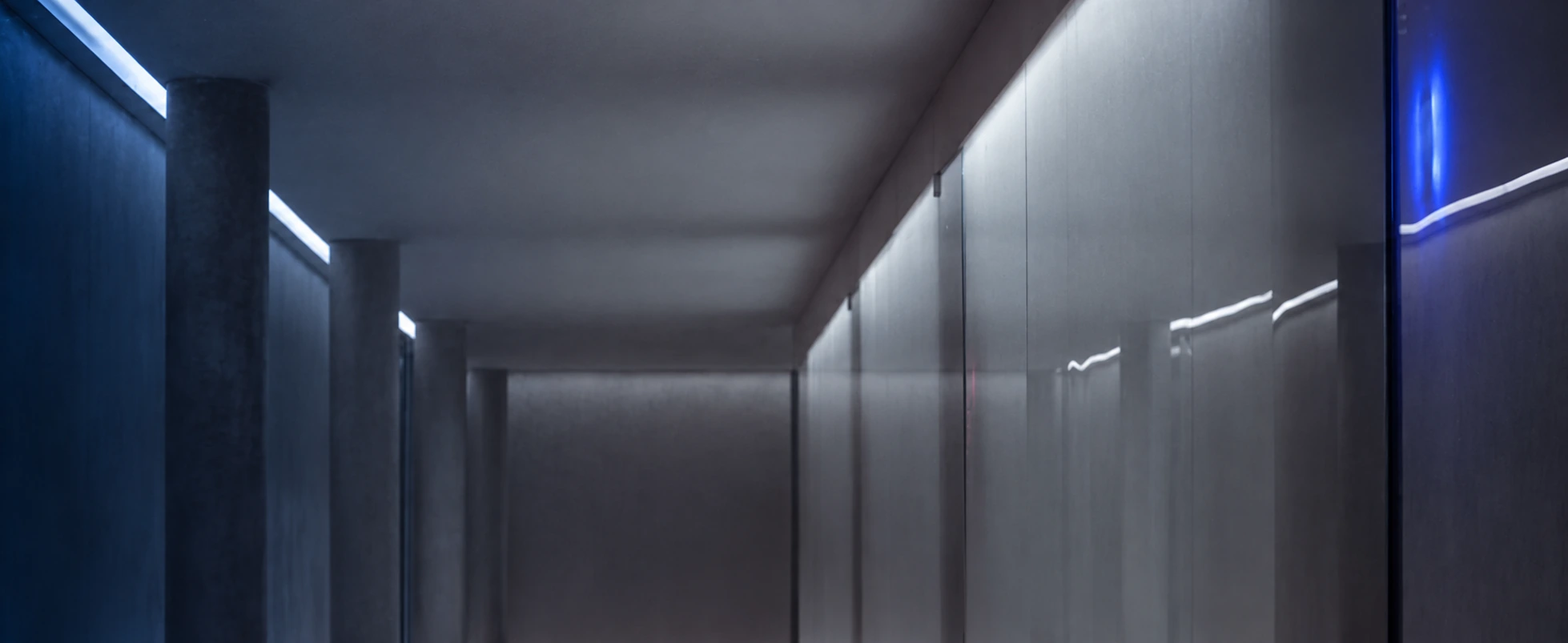 Blue-gray corridor lighting and reflected glass isolated from the photography reference
